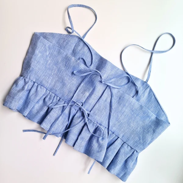 TOP CON PEPLUM