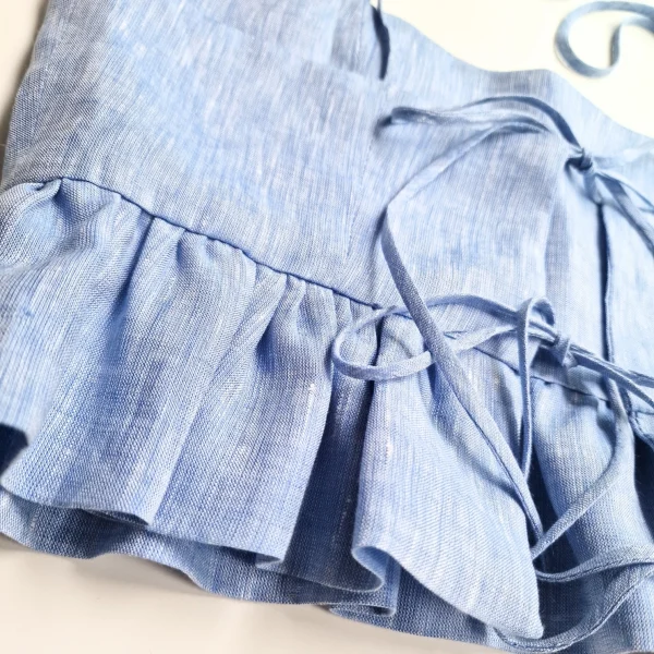 TOP CON PEPLUM
